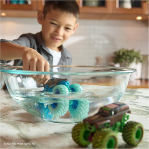 Monster Jam Mud Blasters Grave Digger and Megalodon Color Changing Trucks 1:64 2 Pack Toy for Ages 3+