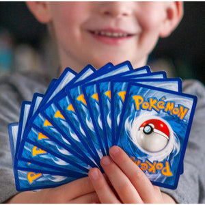Pokémon Mega Collectors Kit, 100 Total Cards, Includes 5 Packs, 1 Holo Foil, Binder, Fun Gift for Kids