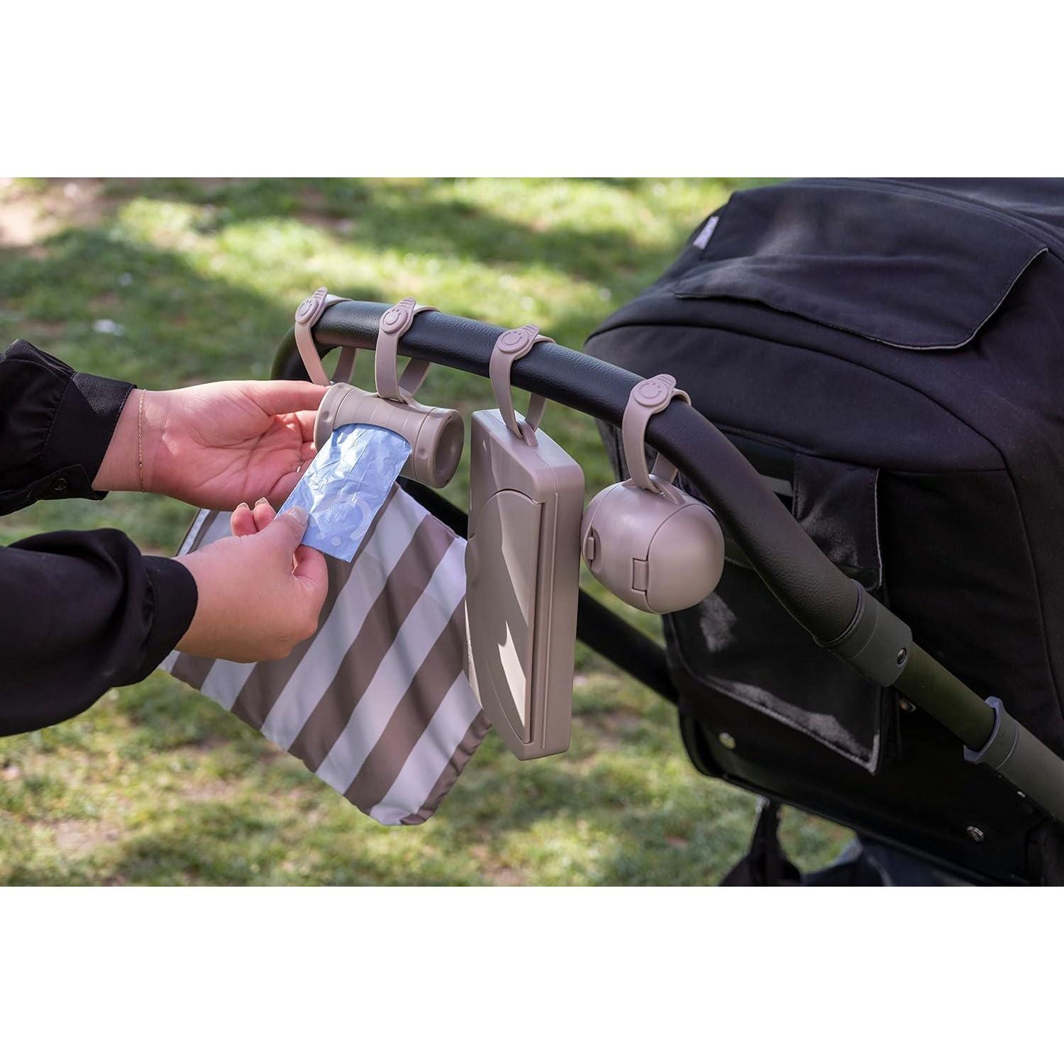 Ubbi Retractable On-the-Go Bag Dispenser For Baby Travel, Diaper Bag Accessory Must Have For Newborns, Helpful Baby Accessory, Taupe,698904102045
